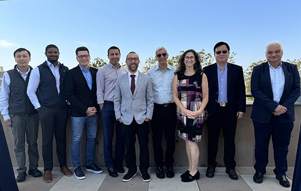 UCI Samueli School Dean Magnus Egerstedt (center) presented 2025 Spring Faculty Awards to (from left) Penghui Cao,  Quinton Smith, Maxim Shcherbakov, Amir AghaKouchak, Vasan Venugopalan, Naomi Chesler, Zhongping Chen, Fadi Kurdahi and Hung Cao (not pictured).